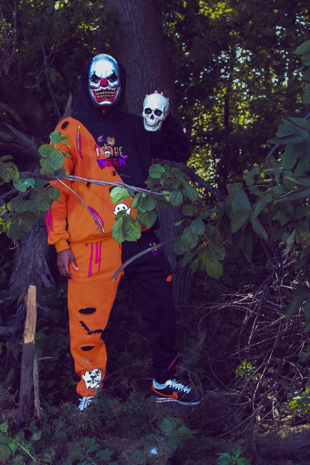 IBeOrigin Halloween hoodie and jogger pant set in orange and black with spooky graphics and mask